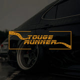 Car with 'Touge Runner' decal on a dark background