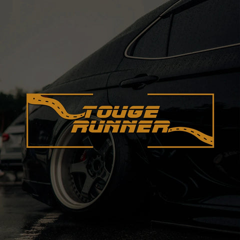 Car with 'Touge Runner' decal on a dark background