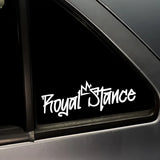 White 'Royal Stance' logo on a car window