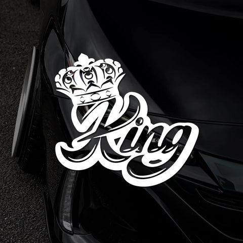 White 'King' decal with a crown on a black car.