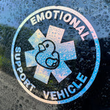 Emotional Support Vehicle sticker with duck icon on a wet surface