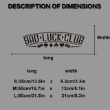 Dimensions chart for 'Bad Luck Club' product with logo on a gray background