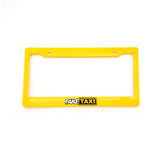 A vibrant yellow license plate frame featuring the bold FAKE TAXI logo on the bottom edge.