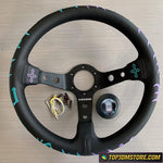 Black steering wheel with decorative elements on a wooden surface, featuring the brand 'Top JDM Store'.