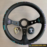 Black steering wheel with decorative elements on a wooden surface, featuring the brand 'Top JDM Store'.