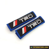Deep blue TRD shoulder pads showing the universal Velcro wrap installation.