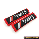 Performance red TRD seat belt covers for Toyota Supra and 86.
