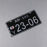 23-06 Ni San JDM License Plate - White