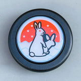 Universal 6-bolt JDM horn button featuring custom white rabbit street style graphics.