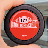 Close-up of a 1967 Rallye Monte-Carlo steering wheel horn button featuring the 177 start number.